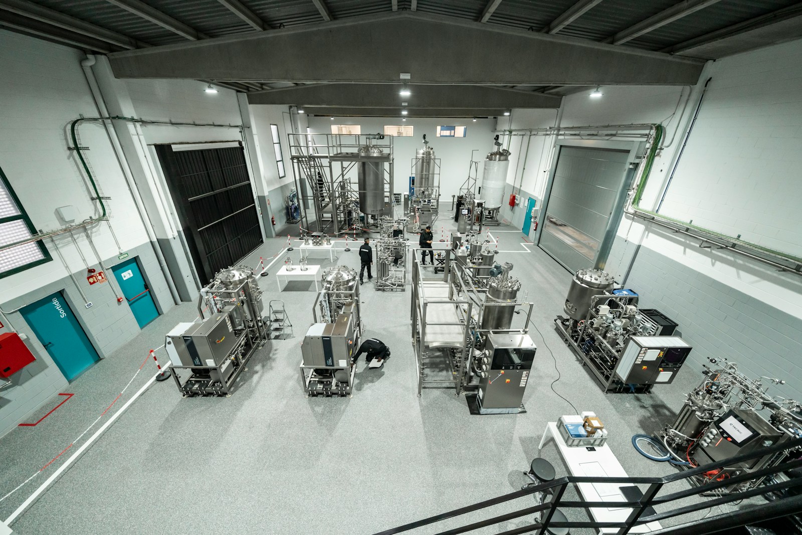 Clean precision manufacturing facility with stainless industrial equipment